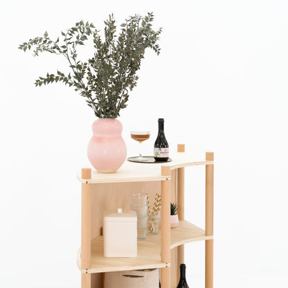 side view of bambuk curved convex checkout counter
