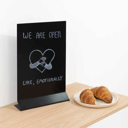 Portable black magnetic sign for tabletop displays at trade fairs and boutique shops