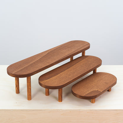 Modern foldable display risers highlighting beauty accessories
