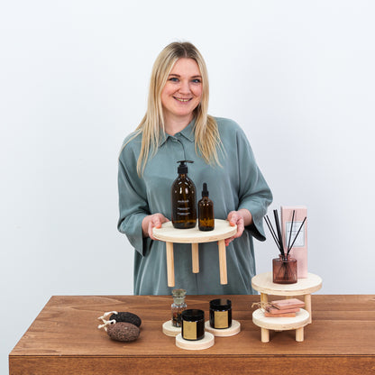 eco-friendly natural wood display risers for candles and jewelry

