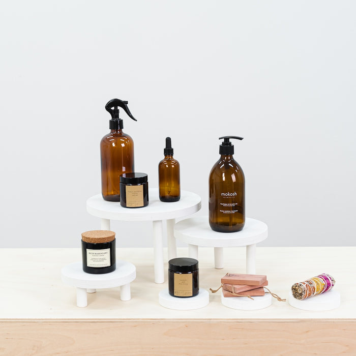 Set of 3 risers in varying heights and white matte finish, ideal for showcasing luxury products.