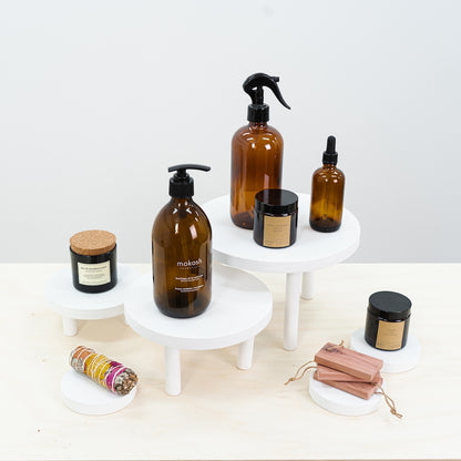 minimalist white display risers for artisan markets and boutiques

