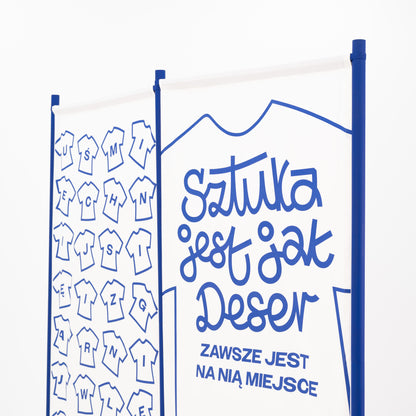 Nahaufnahme der Stangenspitze aus Buchenholz und bedruckter Textildetails