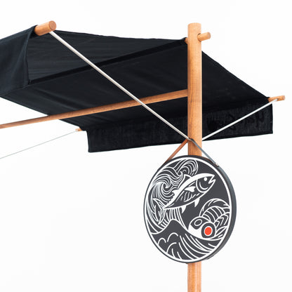 Close-up of the BC-09-W-ML canopy and round hanging logo board with custom fish artwork