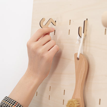 Natural VP-01-NT pegboard stand, perfect for creating a sleek, organized display of products at pop-up shops and events.
