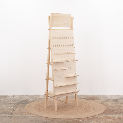 Functional and stylish VP-01-NT pegboard stand in natural wood, featuring customizable branding and ample storage for organized displays.