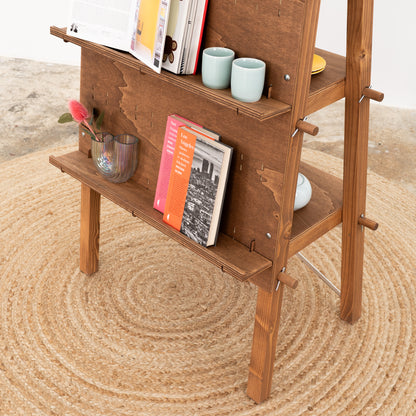 Customizable coffee pegboard stand with a logo panel for brand visibility at trade shows, pop-up shops, or retail spaces.