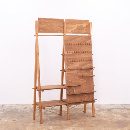 Wooden trade show stand with customizable signage and shelving tiers