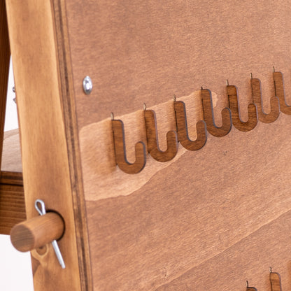 Coffe color short hooks for pegboards, offering easy setup and customization for your display needs in various commercial environments.