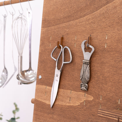 Wooden short hooks in Coffe color, ideal for displaying small products on pegboards in modern retail spaces or event settings.