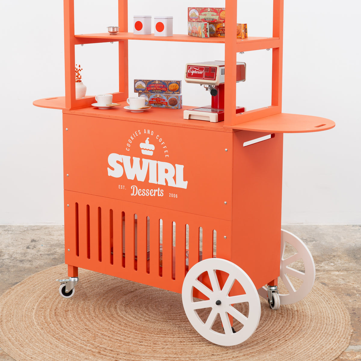 Orange promotional cart with logo – SWIRL product booth with canopy
