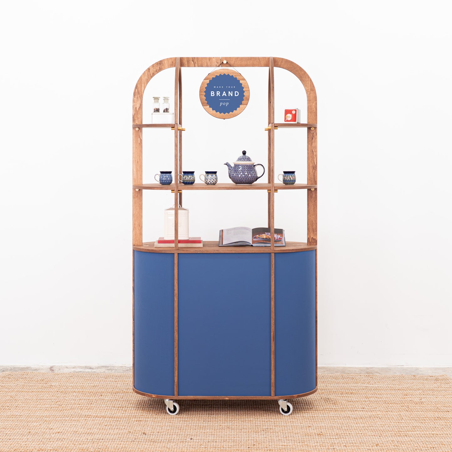 blue display cart with central shelf for retail