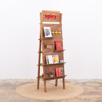 Full view of the VP-01-CF coffee pegboard stand in a retail space, showcasing its modern design and dual-sided storage.