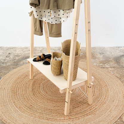 Foldable wooden fashion display with warm neutral styling