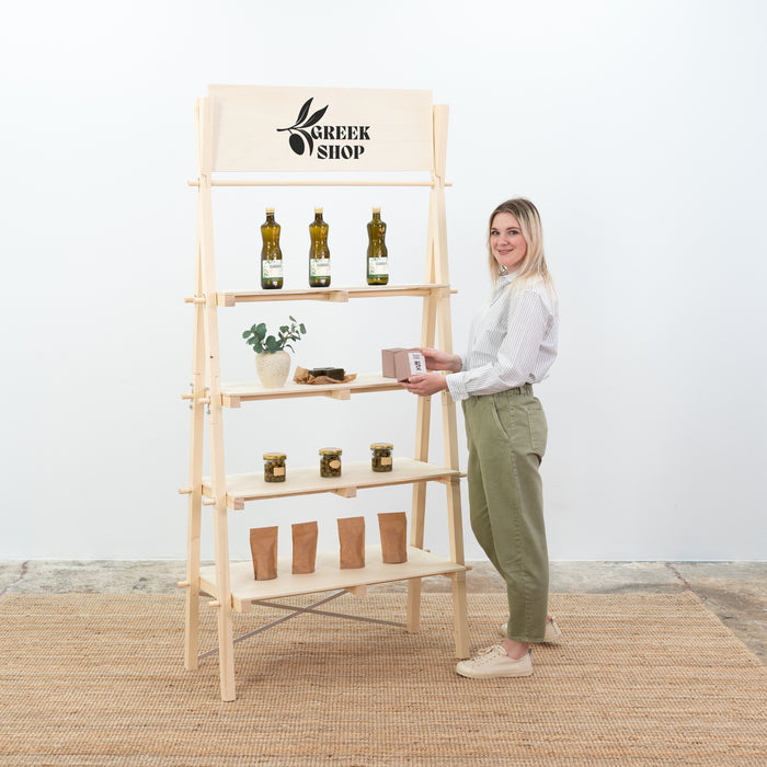 A-frame collapsible shelving unit with wooden slanted shelves for trade shows and pop-up shops