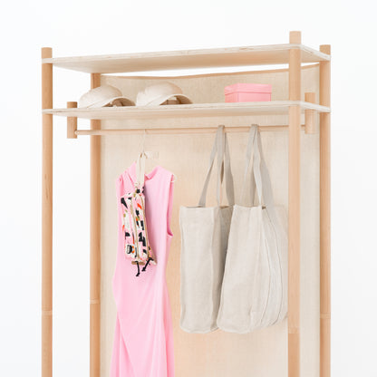 Bambuk clothing rack with cotton panel for pop-up store display