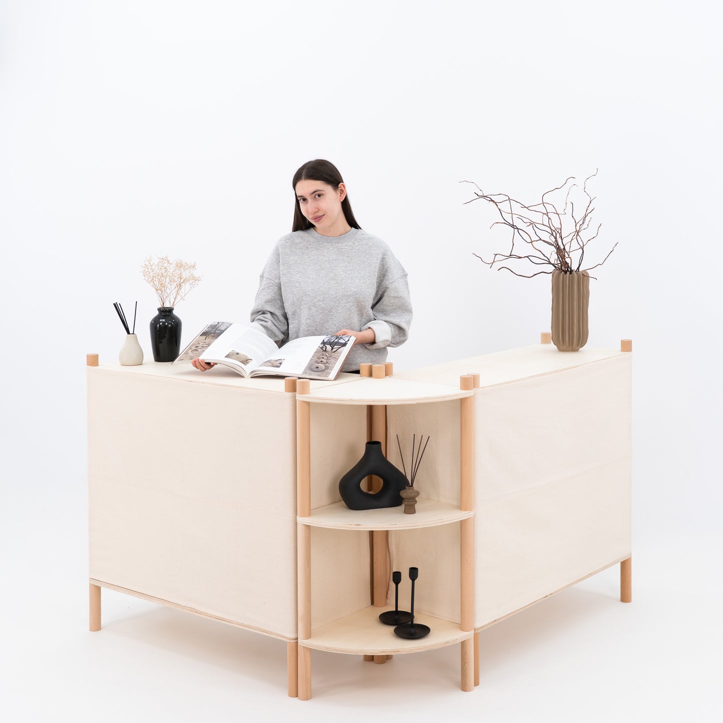 Portable checkout counters arranged with corner shelving