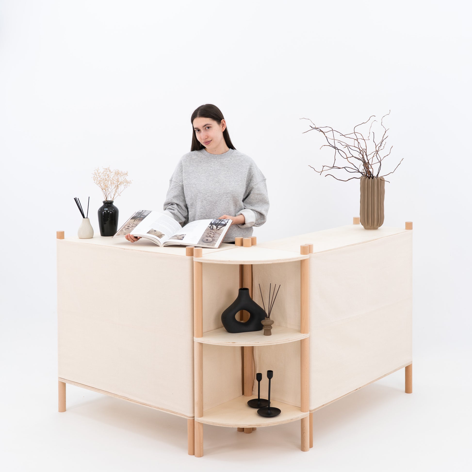 Portable checkout counters arranged with corner shelving
