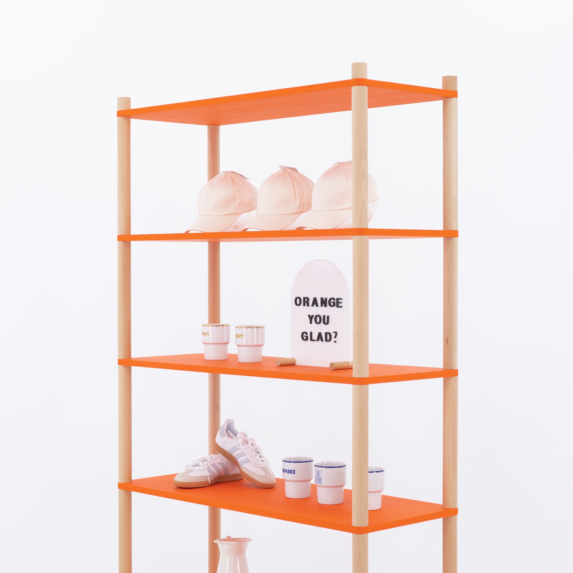 Retail display shelf with custom color shelves and fabric panel