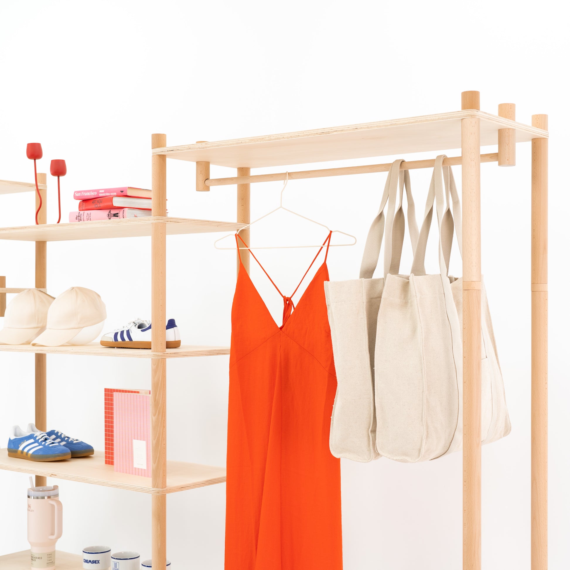 Triple display rack with space for apparel and home goods