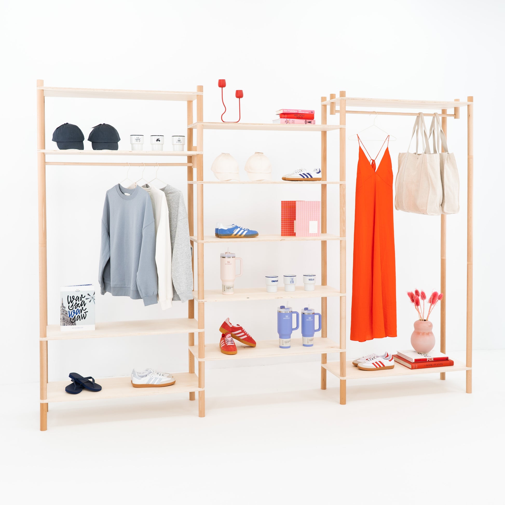 Front view of three-part wooden shelving display