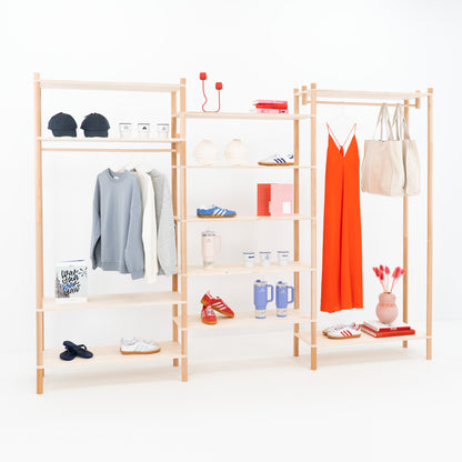 Front view of three-part wooden shelving display