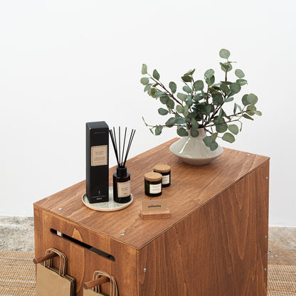 Wooden trade show counter with sliding doors and secure storage compartments